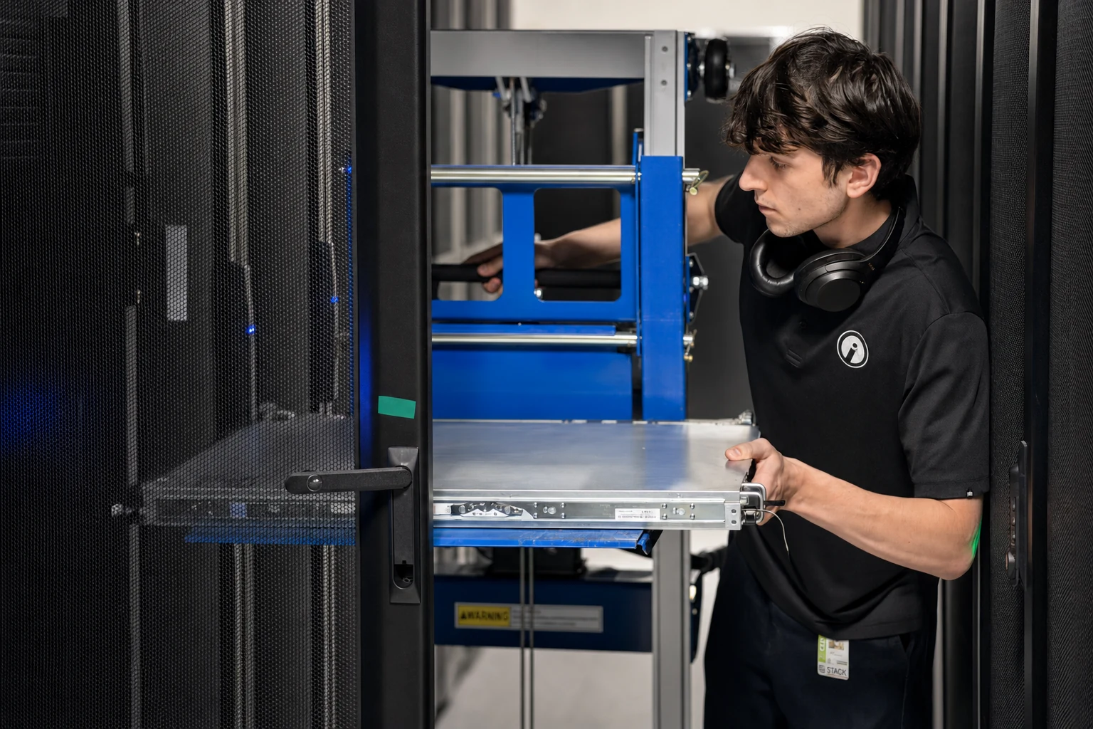 An Opus Interactive engineer working inside the data hall.