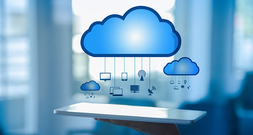 An Opus Interactive blog post image of a person holding a tablet with an overlay of cloud and tech icons.